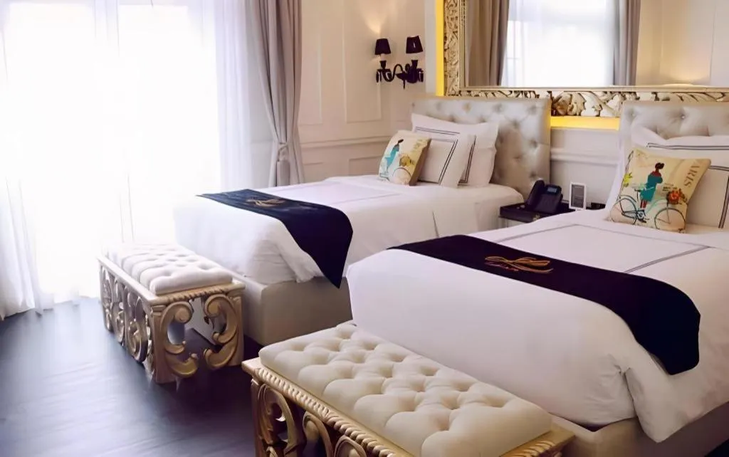 Bed in Lafayette Boutique Hotel