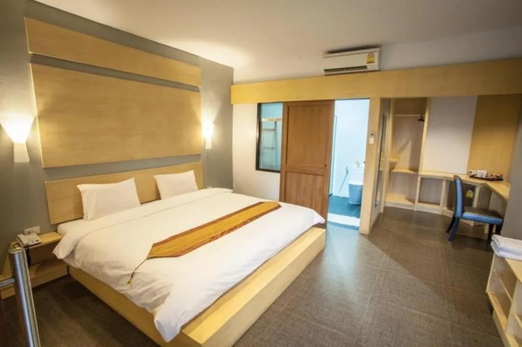 Bed in NH Elegant Hotel