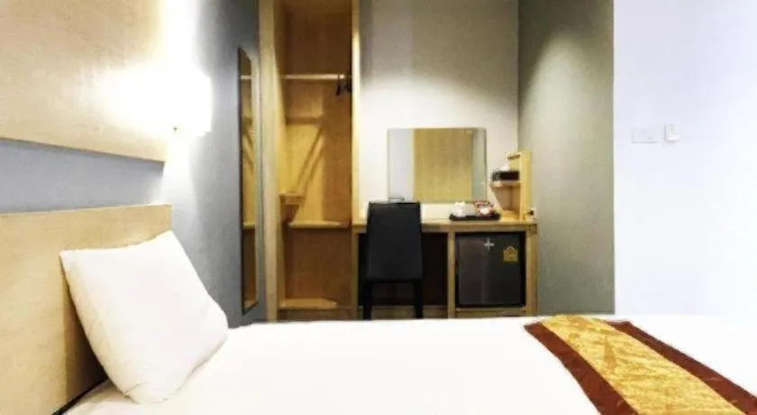 Bed in NH Elegant Hotel