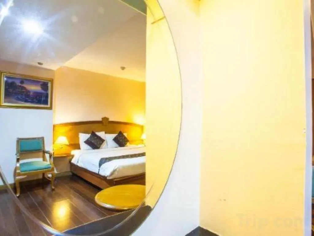 Bed in NH Elegant Hotel