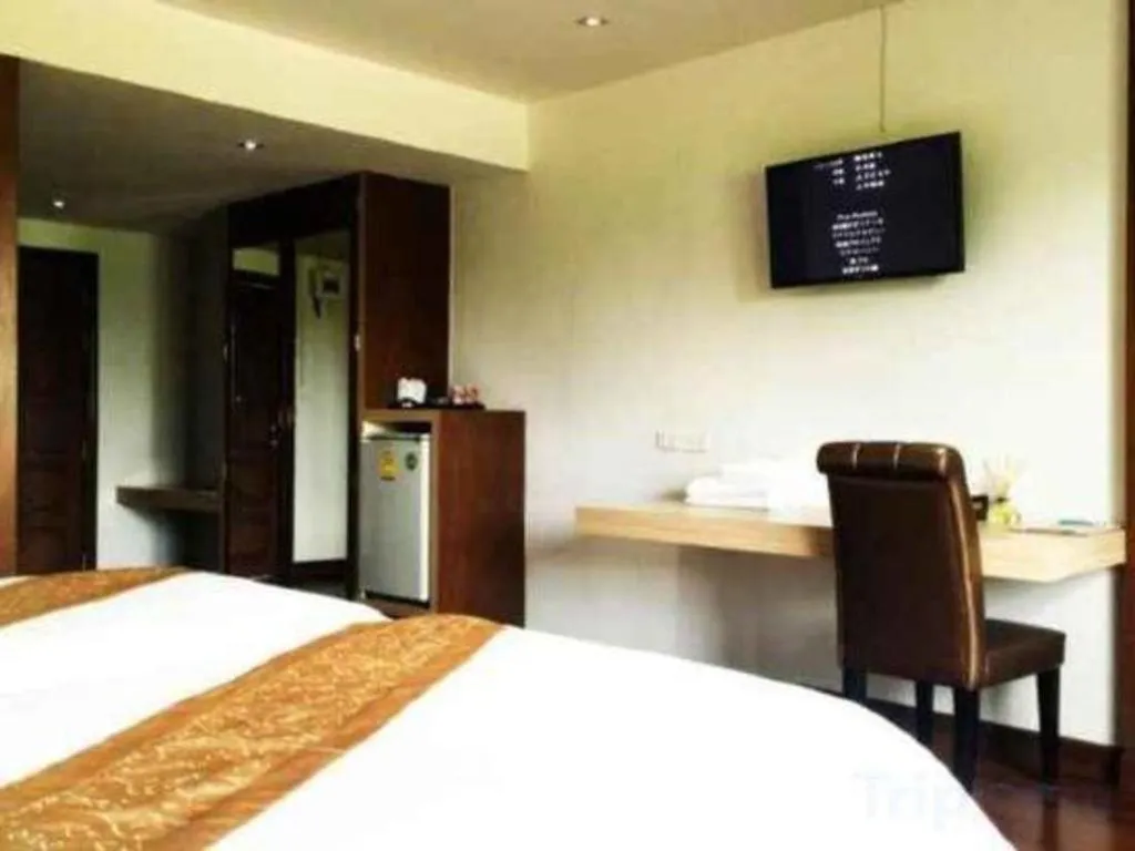 Bed in NH Elegant Hotel