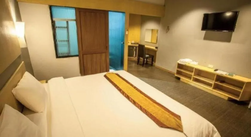 Bed in NH Elegant Hotel