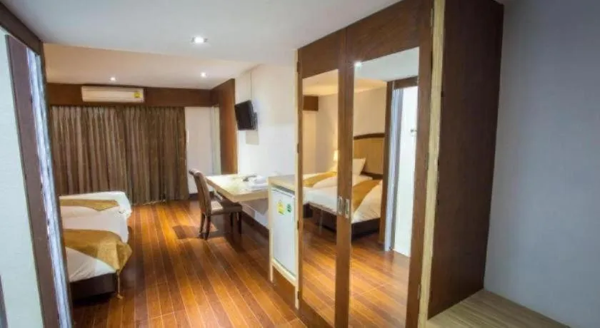 Bed in NH Elegant Hotel