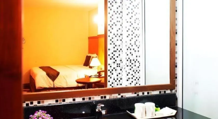 Bed in NH Elegant Hotel