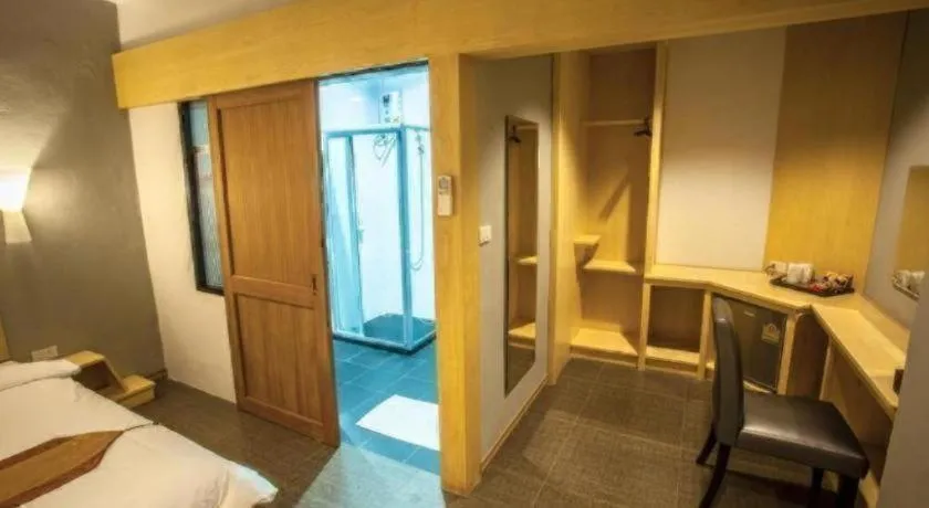 Bed in NH Elegant Hotel