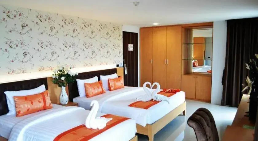 Bed in The Convenience Hotel Bed in The Convenience Hotel