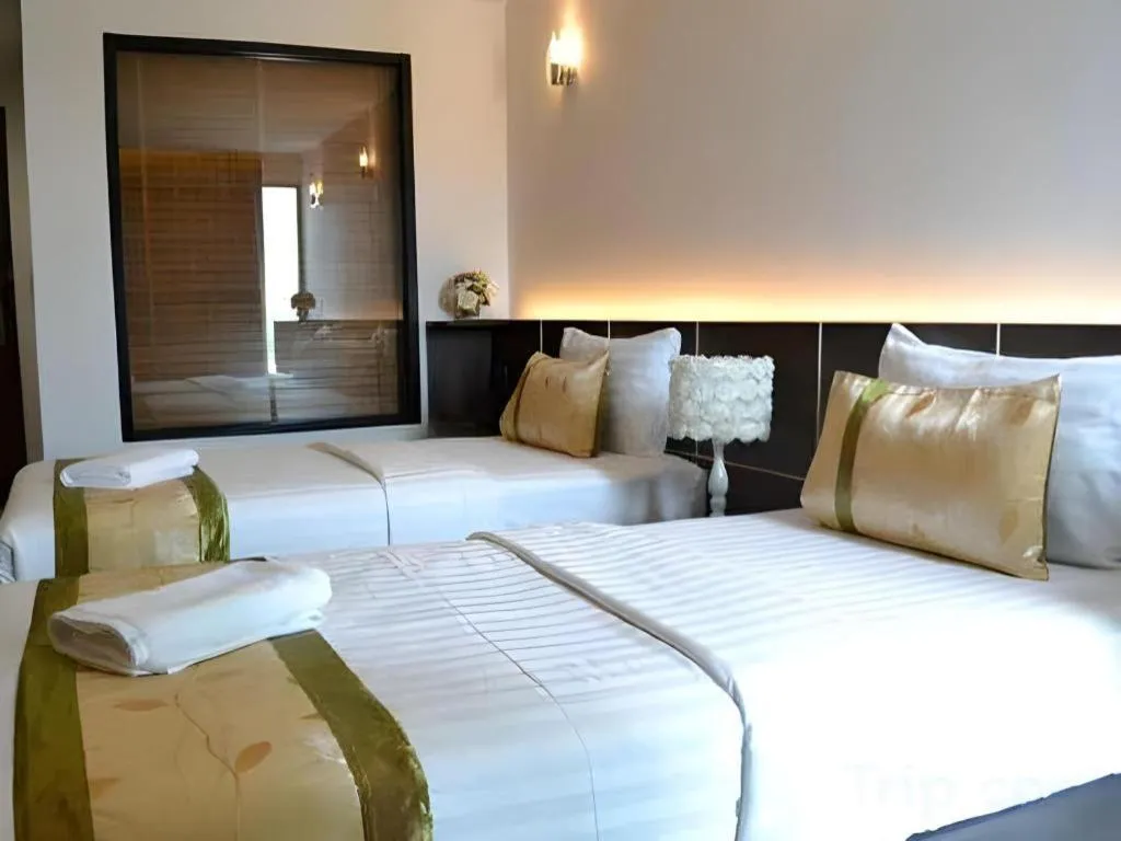 Bed in The Convenience Hotel