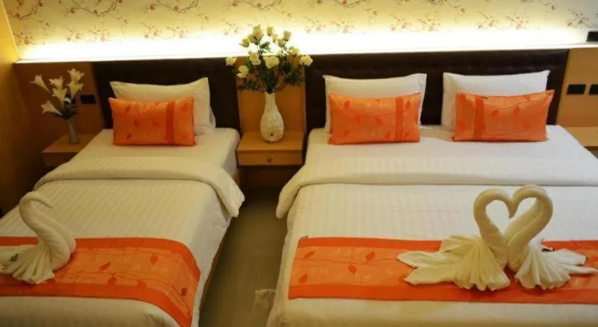 Bed in The Convenience Hotel