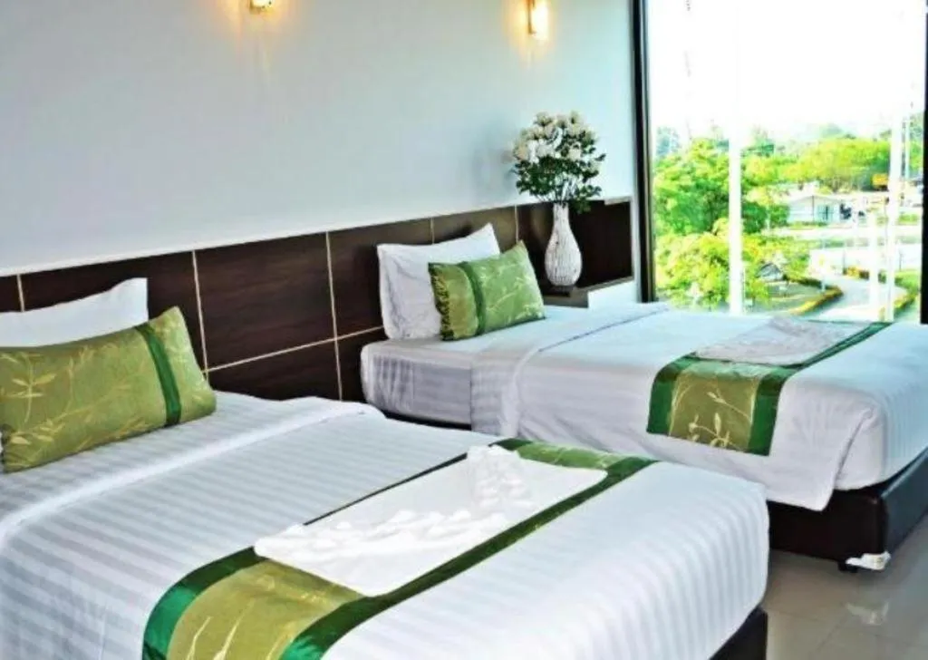 Bed in The Convenience Hotel