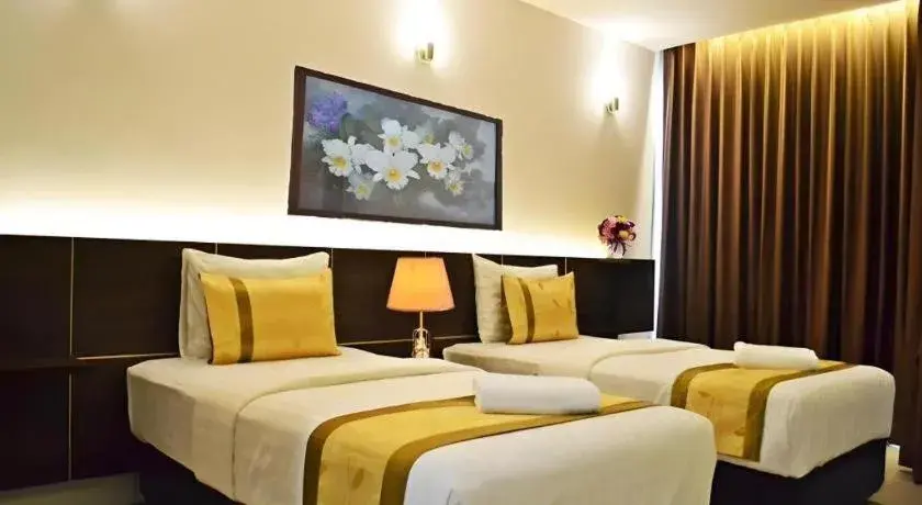 Bed in The Convenience Hotel Bed in The Convenience Hotel