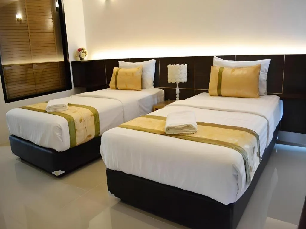 Bed in The Convenience Hotel