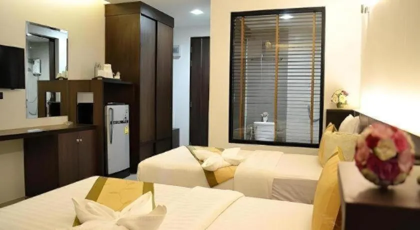 Bed in The Convenience Hotel