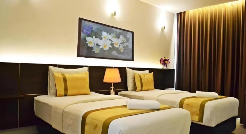 Bed in The Convenience Hotel