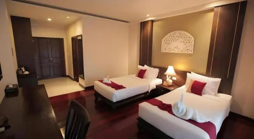 Bed in Wiangkaew Hotel Bed in Wiangkaew Hotel