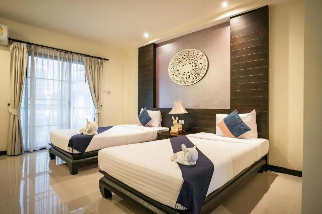 Bed in Wiangkaew Hotel