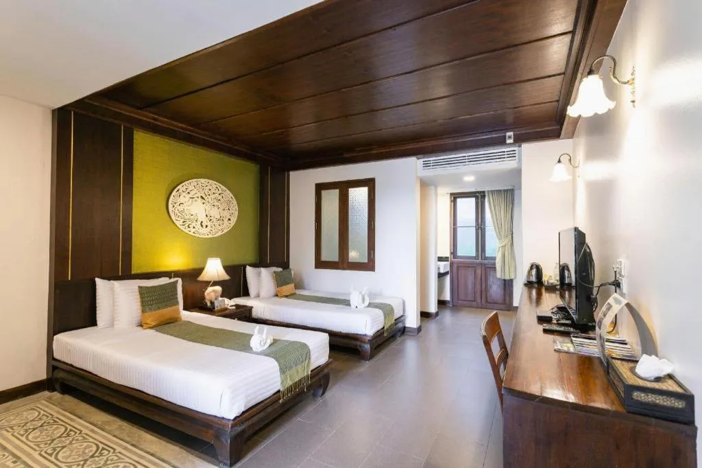 Bed in Wiangkaew Hotel