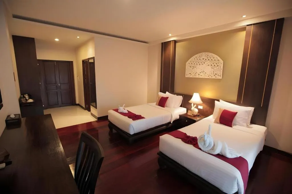 Bed in Wiangkaew Hotel