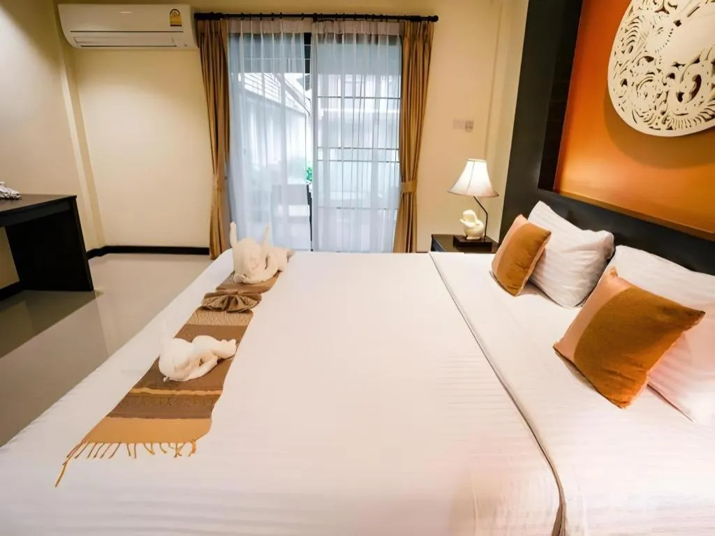 Bed in Wiangkaew Hotel