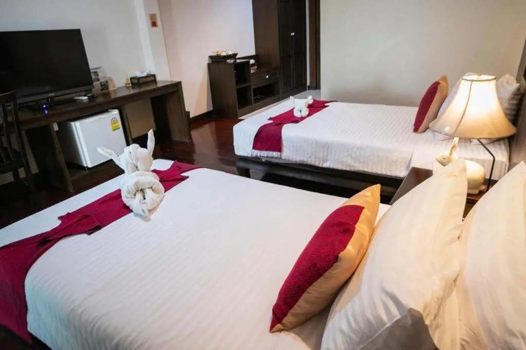 Bed in Wiangkaew Hotel
