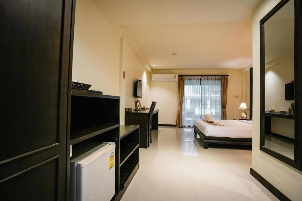 Bed in Wiangkaew Hotel