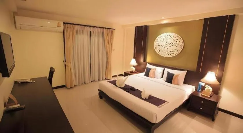 Bed in Wiangkaew Hotel