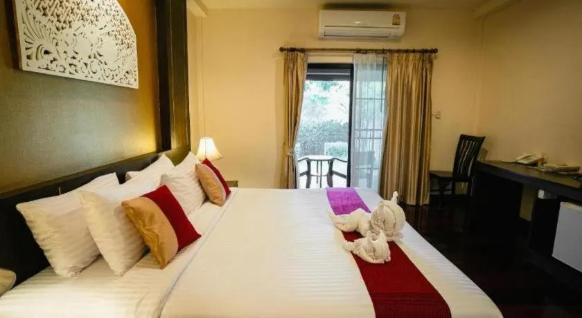 Bed in Wiangkaew Hotel