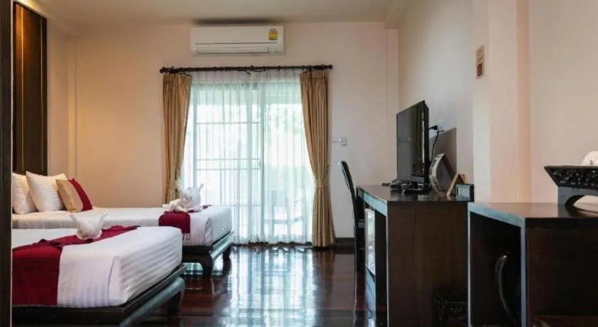 Bed in Wiangkaew Hotel