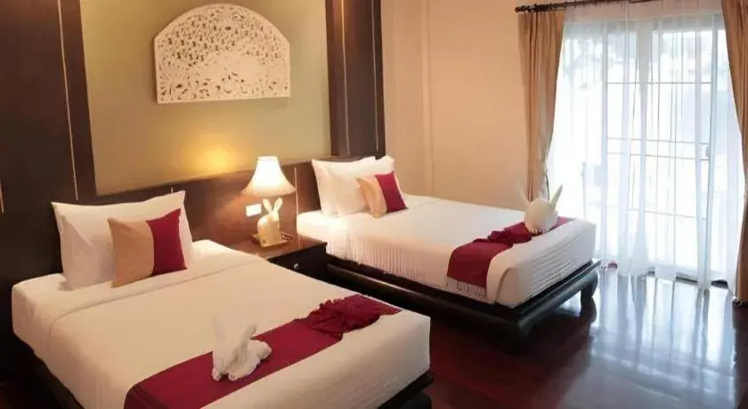 Bed in Wiangkaew Hotel Bed in Wiangkaew Hotel