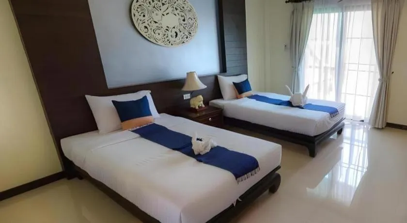 Bed in Wiangkaew Hotel