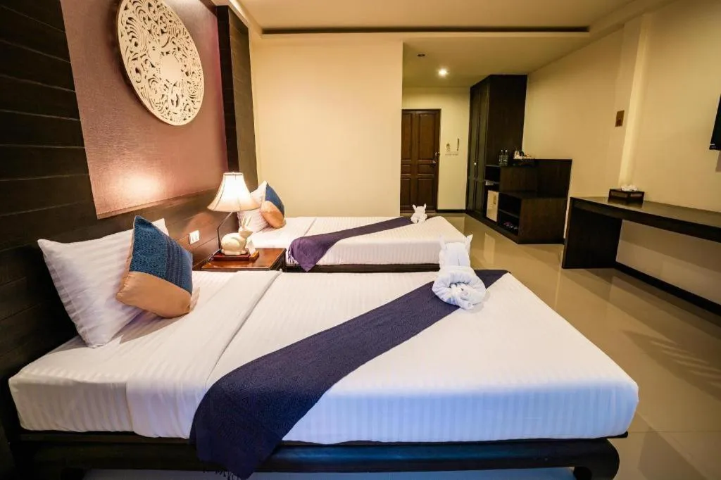 Bed in Wiangkaew Hotel