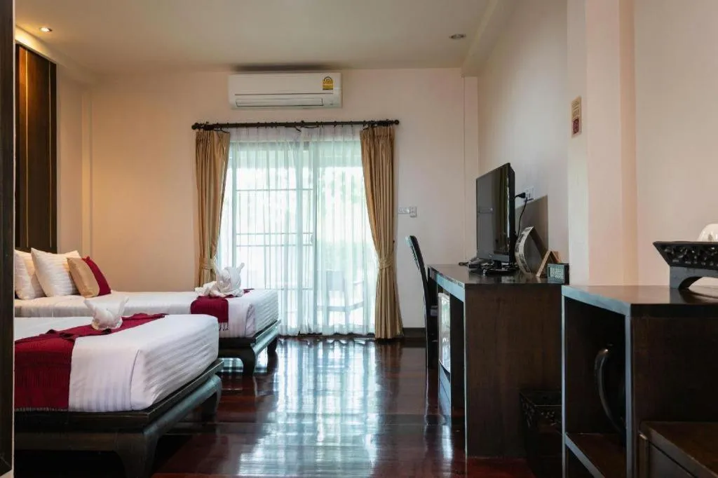 Bed in Wiangkaew Hotel