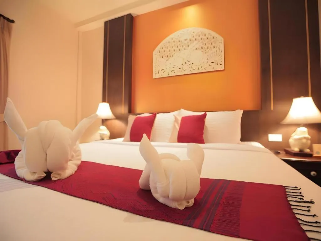 Bed in Wiangkaew Hotel