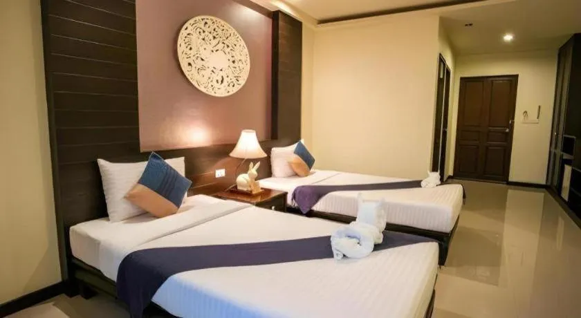 Bed in Wiangkaew Hotel