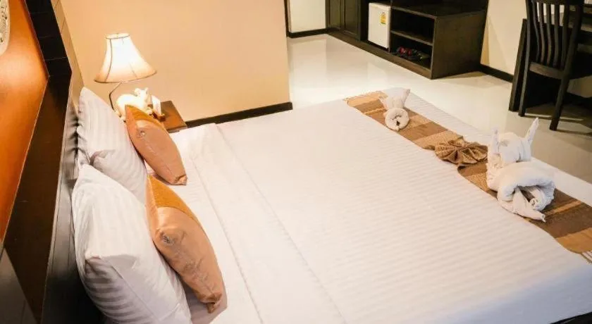 Bed in Wiangkaew Hotel