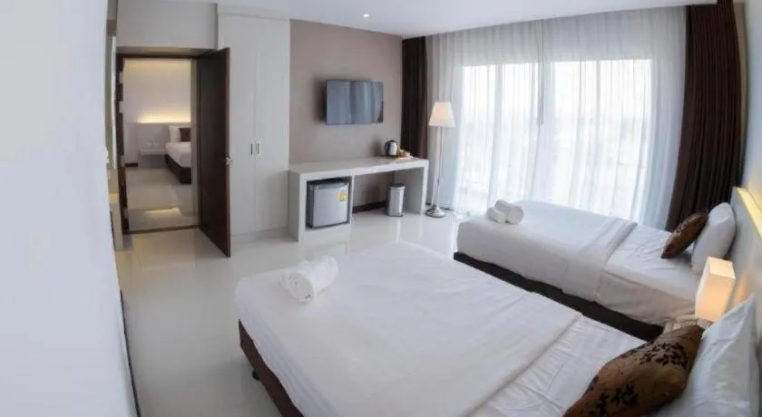 Bed in Chaisaeng Villa