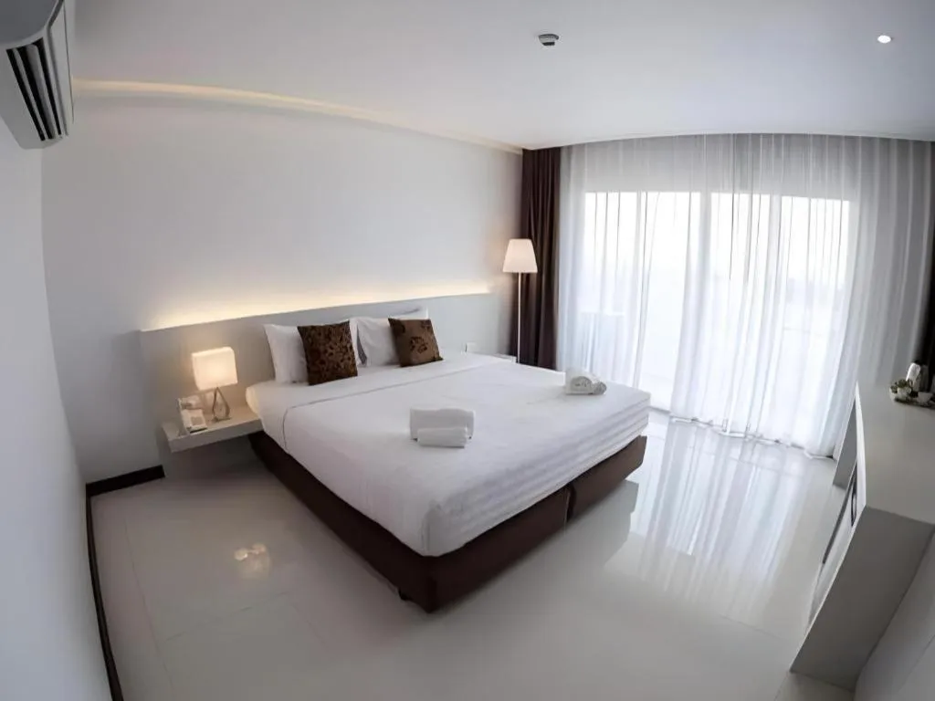 Bed in Chaisaeng Villa
