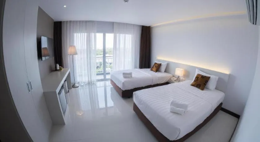 Bed in Chaisaeng Villa