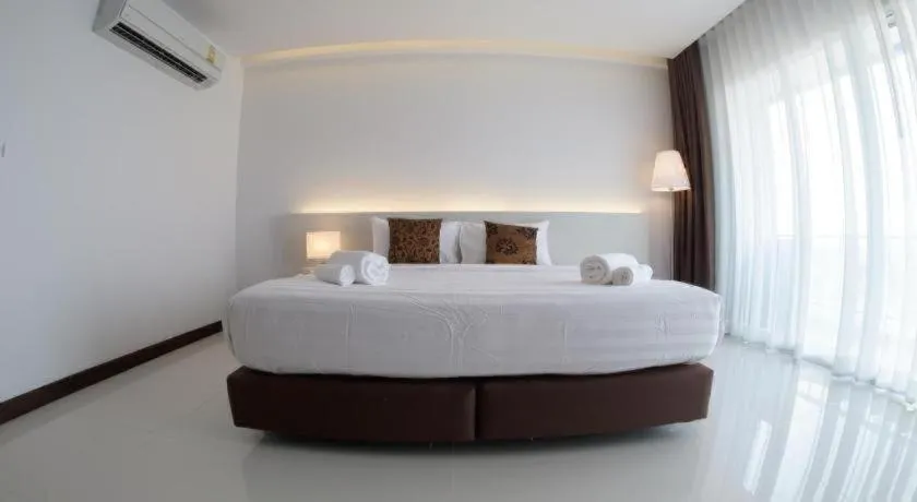 Bed in Chaisaeng Villa