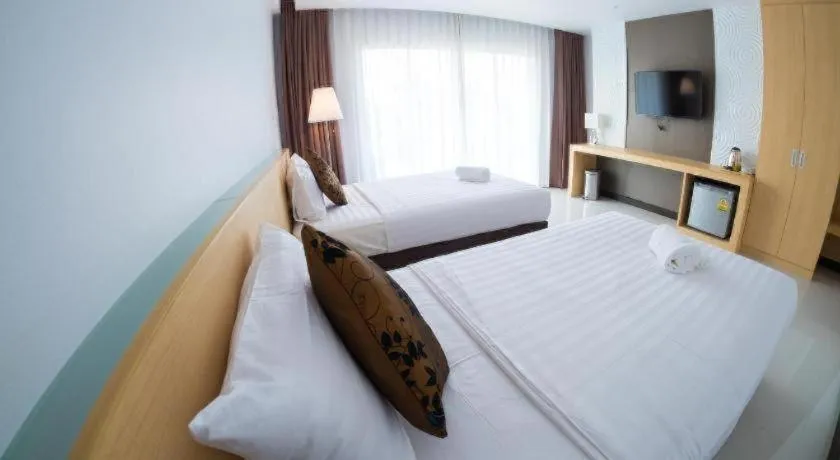 Bed in Chaisaeng Villa