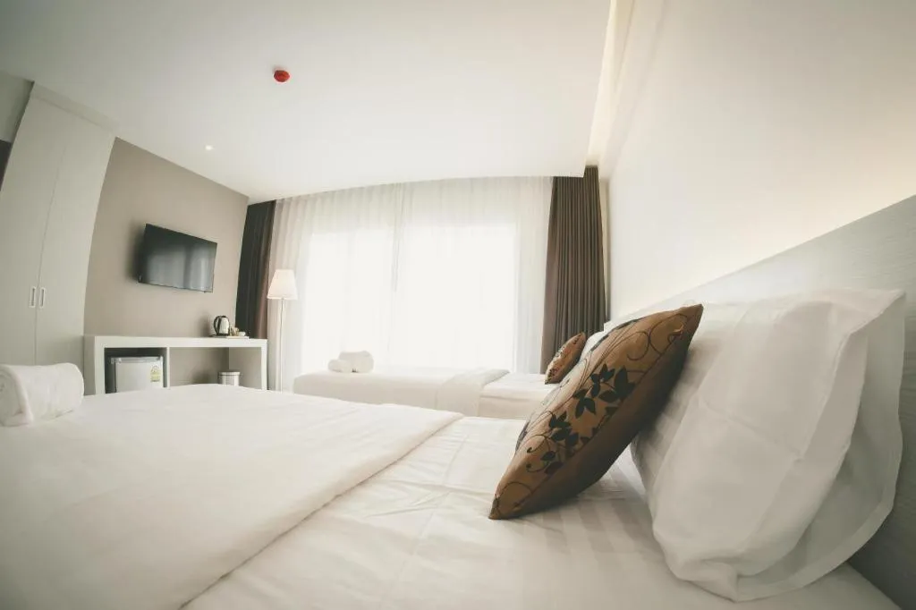 Bed in Chaisaeng Villa