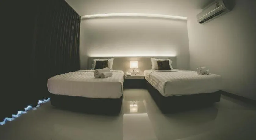 Bed in Chaisaeng Villa