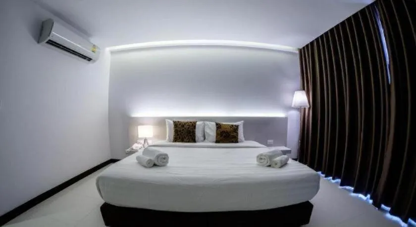 Bed in Chaisaeng Villa