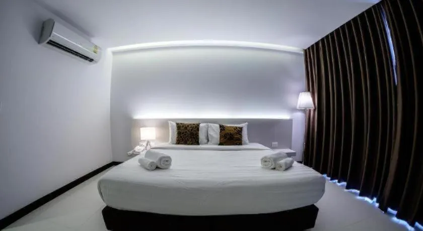 Bed in Chaisaeng Villa