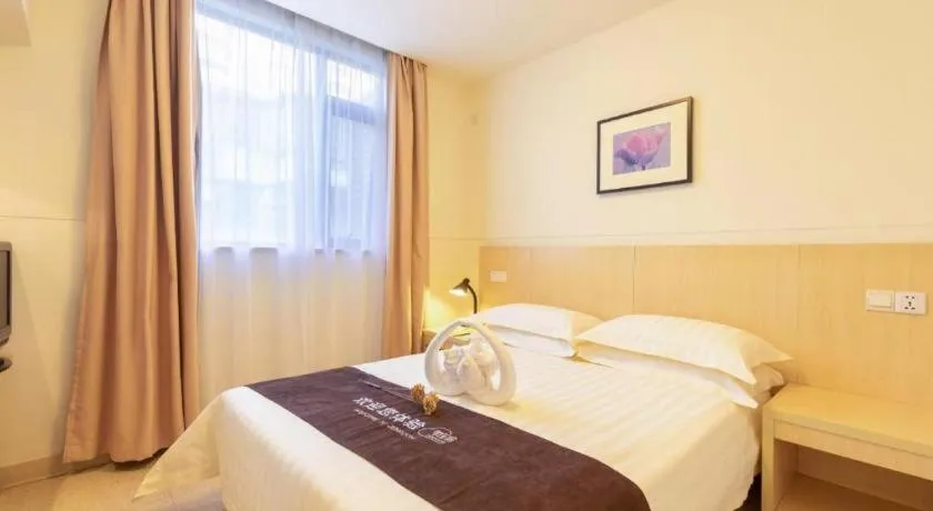 Bed in Jinjiang Inn Guangzhou Liwan Caihongqiao Metro Station