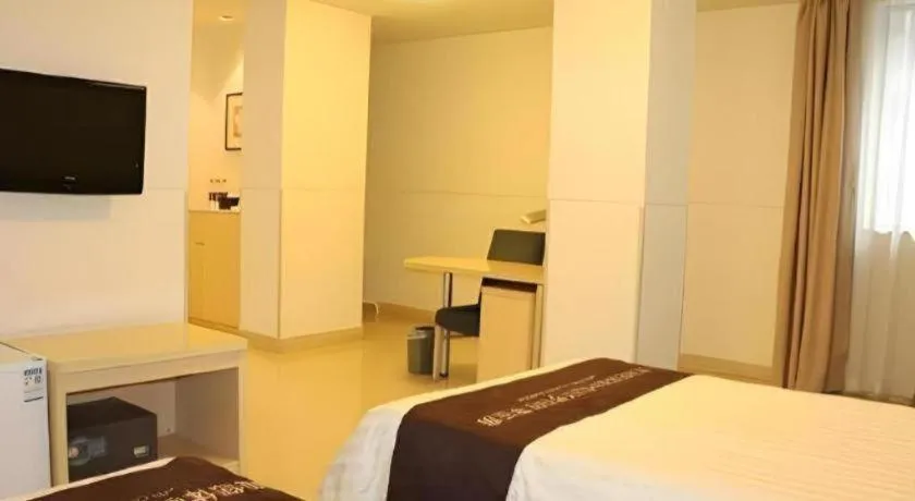 Bed in Jinjiang Inn Guangzhou Liwan Caihongqiao Metro Station