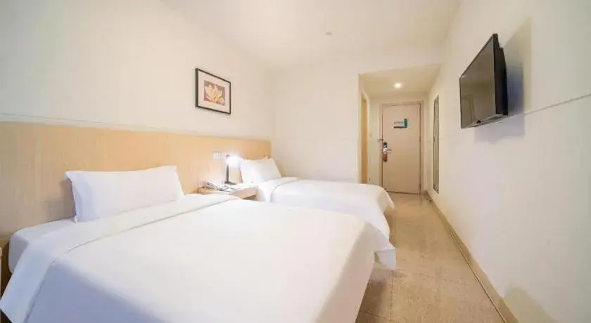 Bed in Jinjiang Inn Guangzhou Liwan Caihongqiao Metro Station Bed in Jinjiang Inn Guangzhou Liwan Caihongqiao Metro Station
