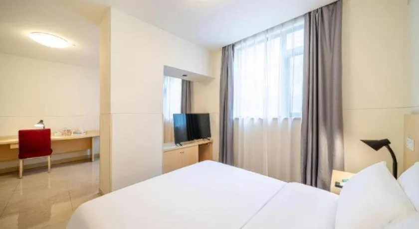 Bed in Jinjiang Inn Guangzhou Liwan Caihongqiao Metro Station