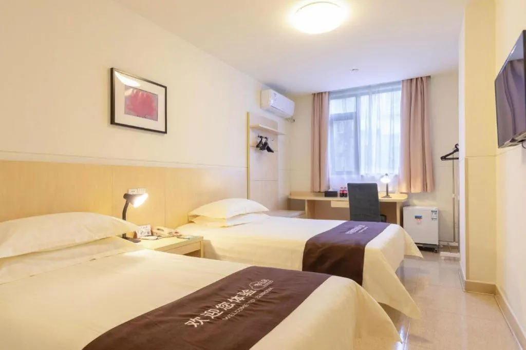 Bed in Jinjiang Inn Guangzhou Liwan Caihongqiao Metro Station