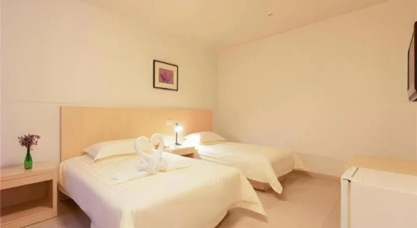 Bed in Jinjiang Inn Guangzhou Liwan Caihongqiao Metro Station