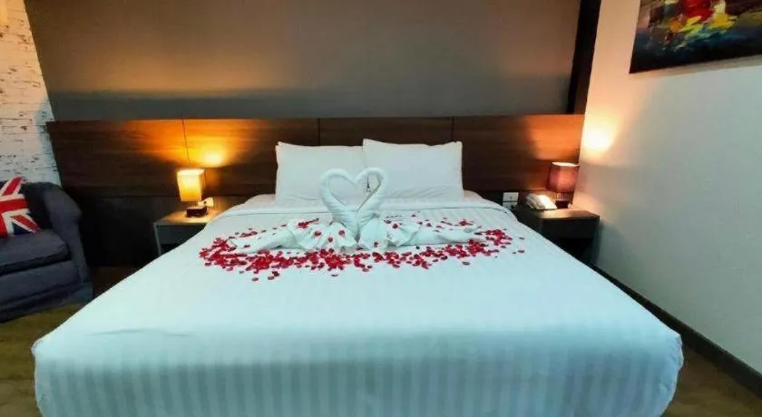 Bed in The Loft Seaside Sriracha Hotel